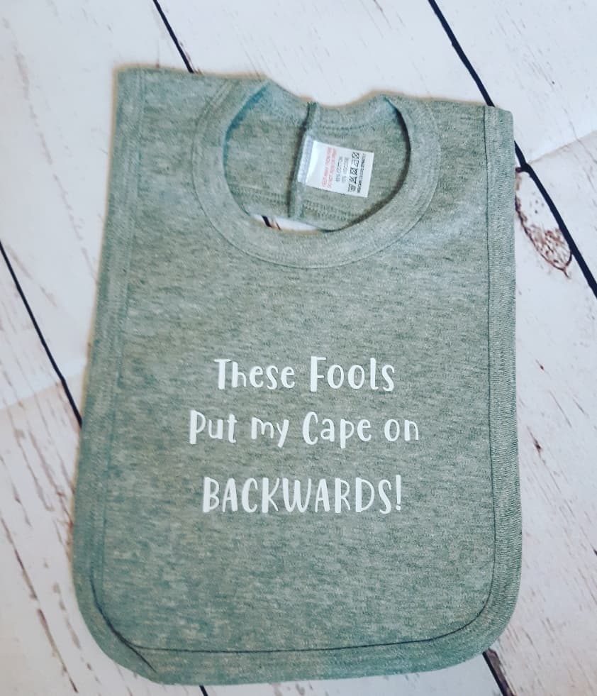 These Fools Put My Cape On Backwards Bib